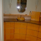 Curved birdseye vanity left