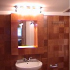 Squared bathroom, cherry wood medicine cabinet